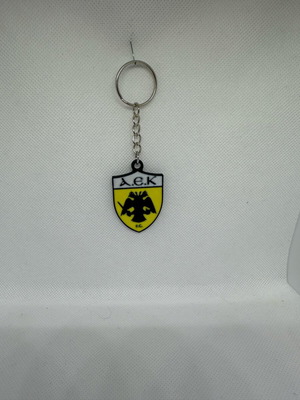 AEK keychain like new with double-headed eagle