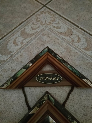 Wall-mounted polyframe used with 2 frames and mirror