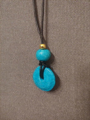 Handmade long necklace with leather cord and turquoise ceramic pendant in very good condition