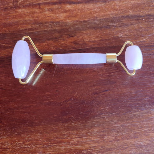 Face roller made of genuine rose quartz, like new