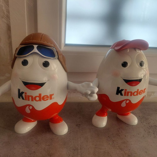 Two large Kinder collectible figures