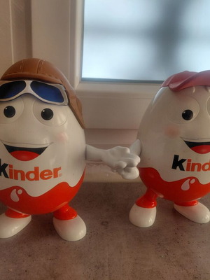 Two large Kinder collectible figures