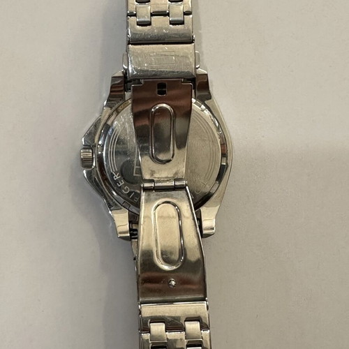 Tommy Hilfiger men's watch like new with blue dial and steel bracelet