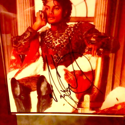 Michael Jackson autograph used in framed glass display