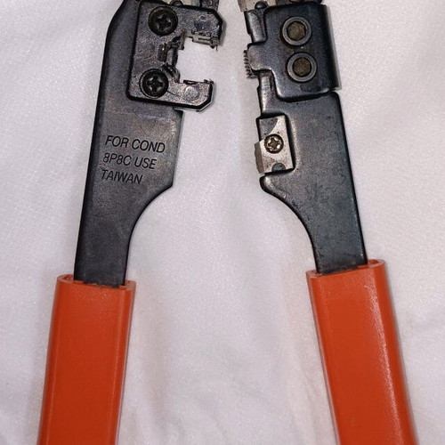 Crimping tool like new for network and telephone plugs
