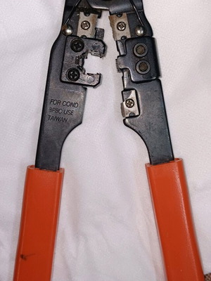 Crimping tool like new for network and telephone plugs