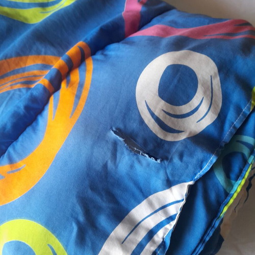 Single quilt used with slight wear