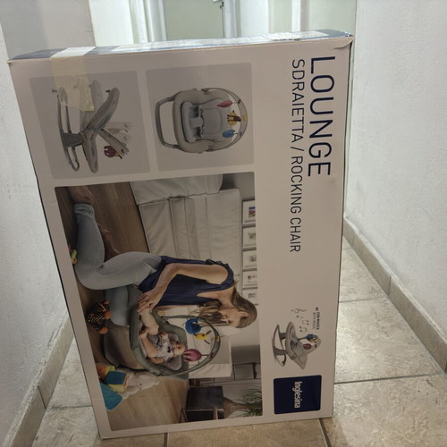 Inglesina Lounge rocking chair used for babies with music toys