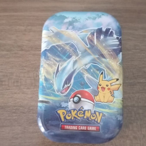 Pokémon trading card mystery metal pack with 65+ cards
