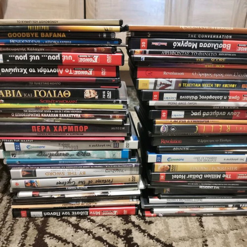 Collection of 60 used DVDs with classic and adventure movies