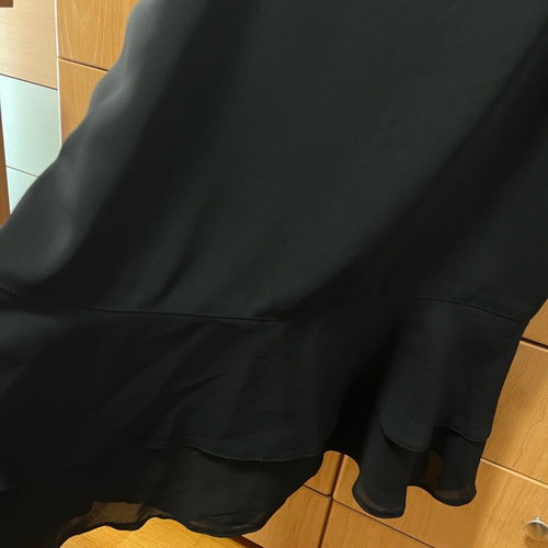 Black skirt with design and zipper Large like new
