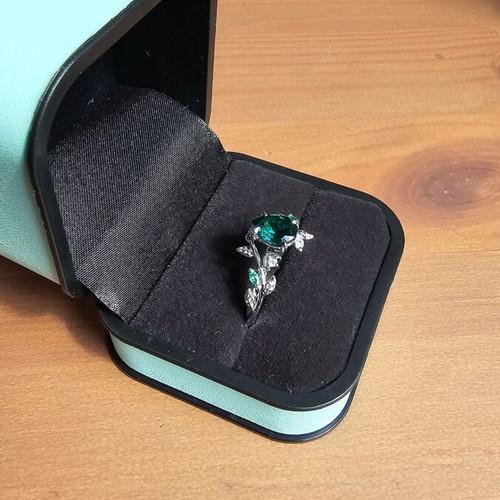 14K White Gold Engagement Ring with Emerald and Moissanite
