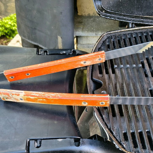 Barbecue set used with stainless steel fork and spatula with wooden handles