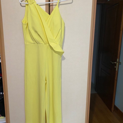 Yellow one-piece jumpsuit used with ring and strap, size M