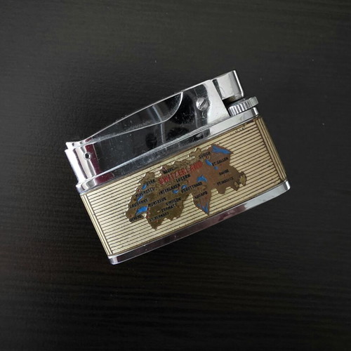Vintage Switzerland Collectible Pocket Lighter used, fully functional