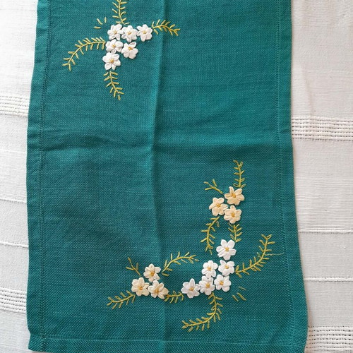 Embroidered handmade table linen in dark green like new