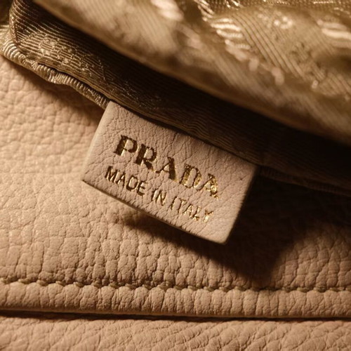 Prada leather shoulder tote cream color used