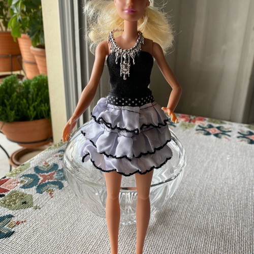 Collectible Barbie doll like new, well preserved and clean