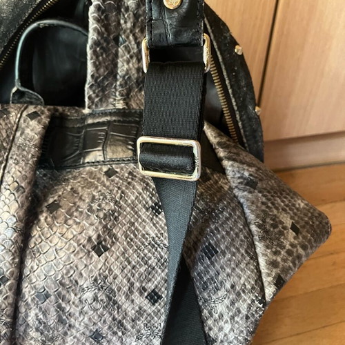 MCM Stark Python Print Backpack used, gray with studs