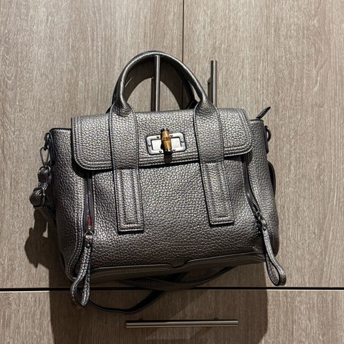 Nora’s silver handbag new with shoulder strap