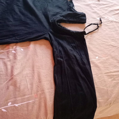 H&M black blouse with shoulder cutouts and cords, new