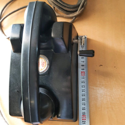 Antique telephone with crank used, 1920-30