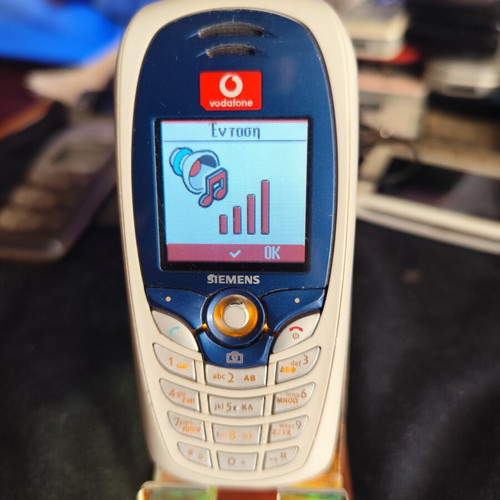 Siemens C65 mobile phone used, some keys not working, no charger