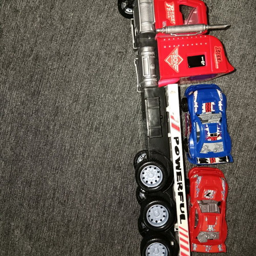 Toy truck like new with two toy cars