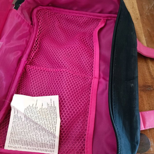 Avon cosmetic bag used, black and pink, collector's edition