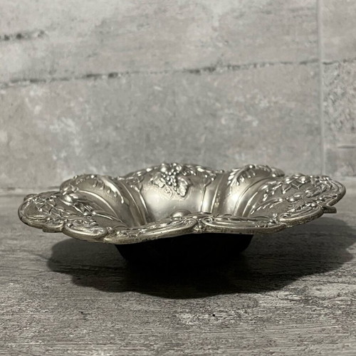 Decorative metal bowl used with embossed design