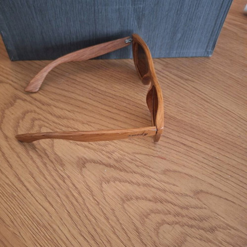 Woody wooden sunglasses used, with arm needing screwing