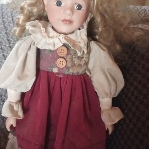 Porcelain doll like new