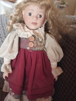 Porcelain doll like new