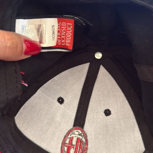 ACM Milan cap like new referee
