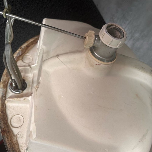 Bathroom sink used with faucet