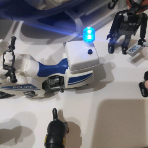 Playmobil police set with helicopter, 2 cars, motorcycle, boat and 11 figures like new