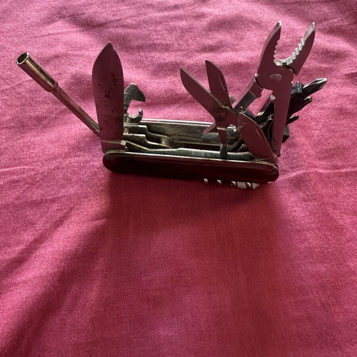 Victorinox SwissTool multitool used, authentic Swiss pocket knife