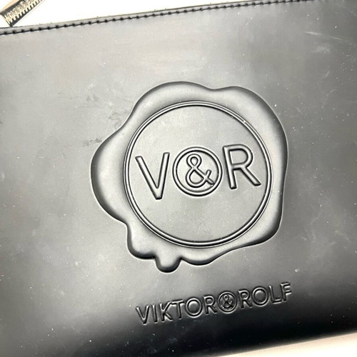 Victor & Rolf black zip clutch bag used