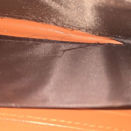 Wallet used, blue with orange details