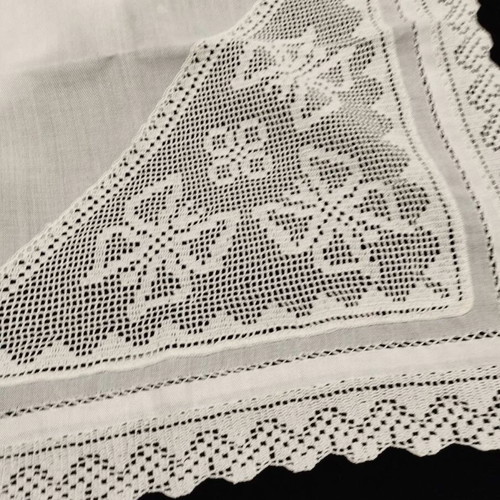 Handmade embroidered doily with crochet used