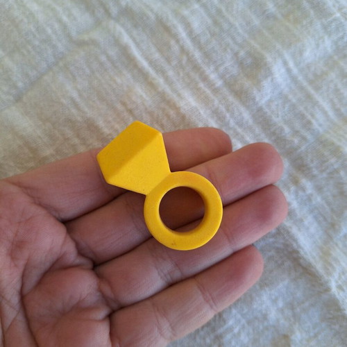 Yellow eraser in ring shape like new