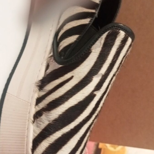 Cricket Zebra women's shoes like new with platform sole