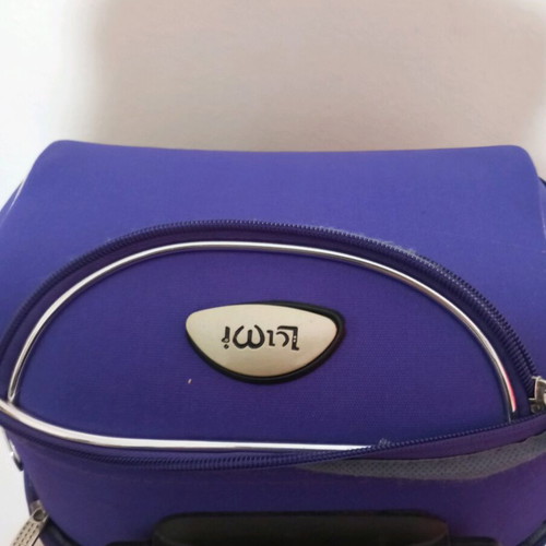 Small travel suitcase purple like new with many compartments