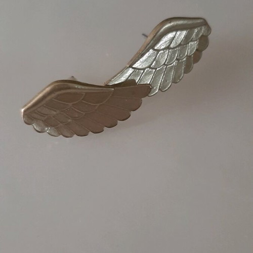 Feather earrings like new, gold-colored