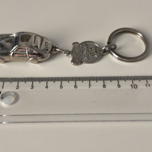 Lumidis Papagalos Collectible Metal Keychain like new