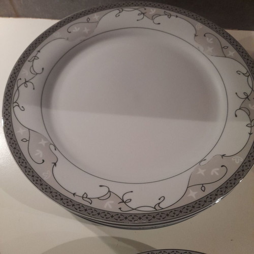 Fine Porcelain Forum dinnerware set new with 1 broken plate
