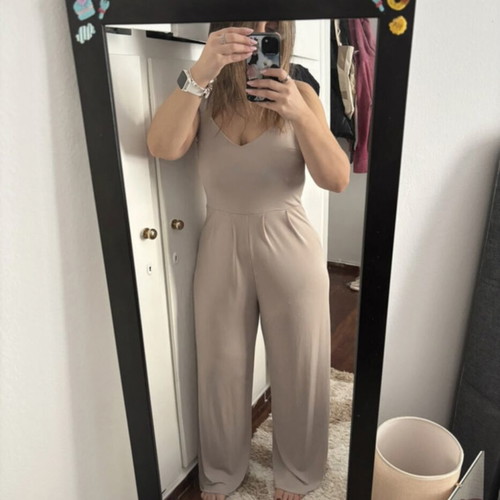 Jumpsuit beige, like new, with unique back design