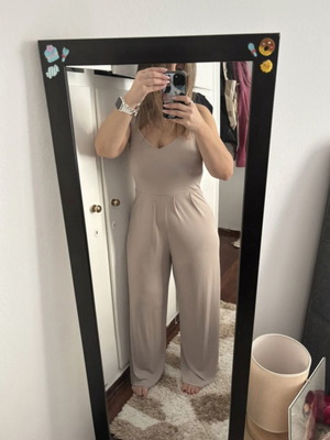 Jumpsuit beige, like new, with unique back design