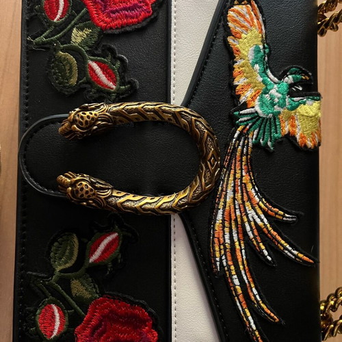 Leather shoulder bag like new, black with multicolor details