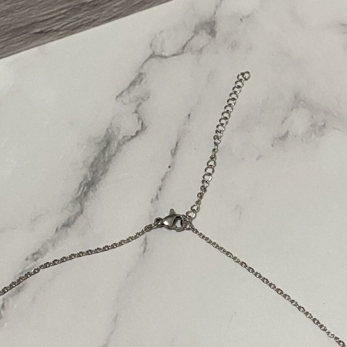 Monogram Necklace like new, silver color